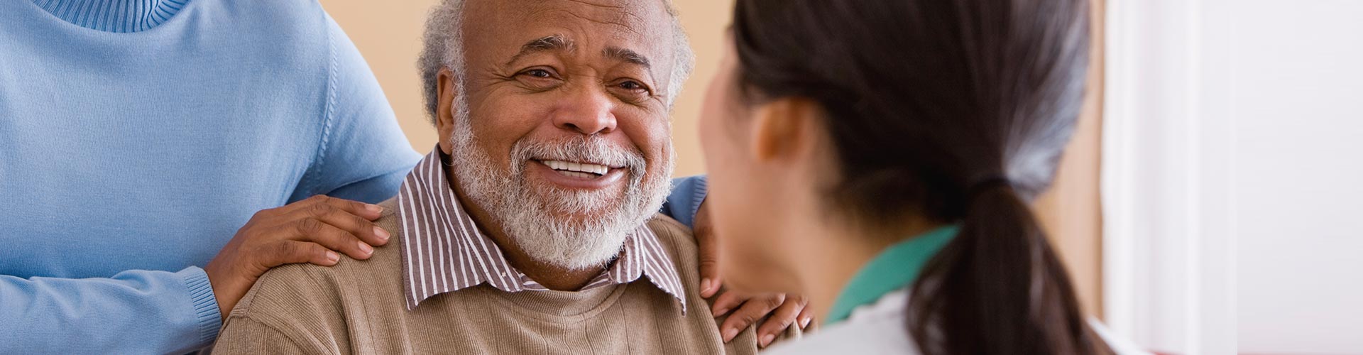 man talking to medical professional