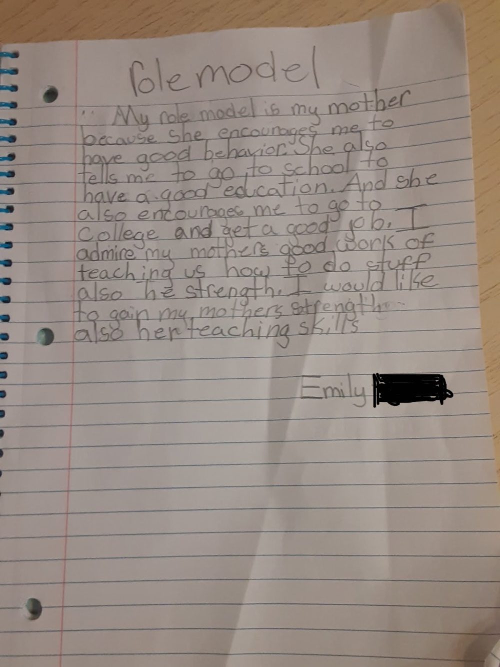 a letter handwritten by a child about her role model mother