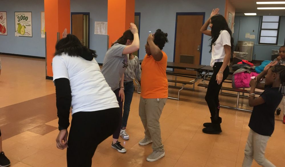 A group of girls dancing