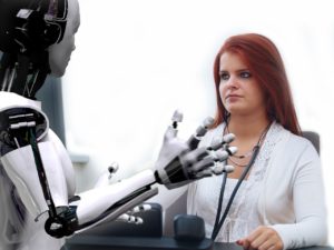 A robot engaged in conversation with a female health professional