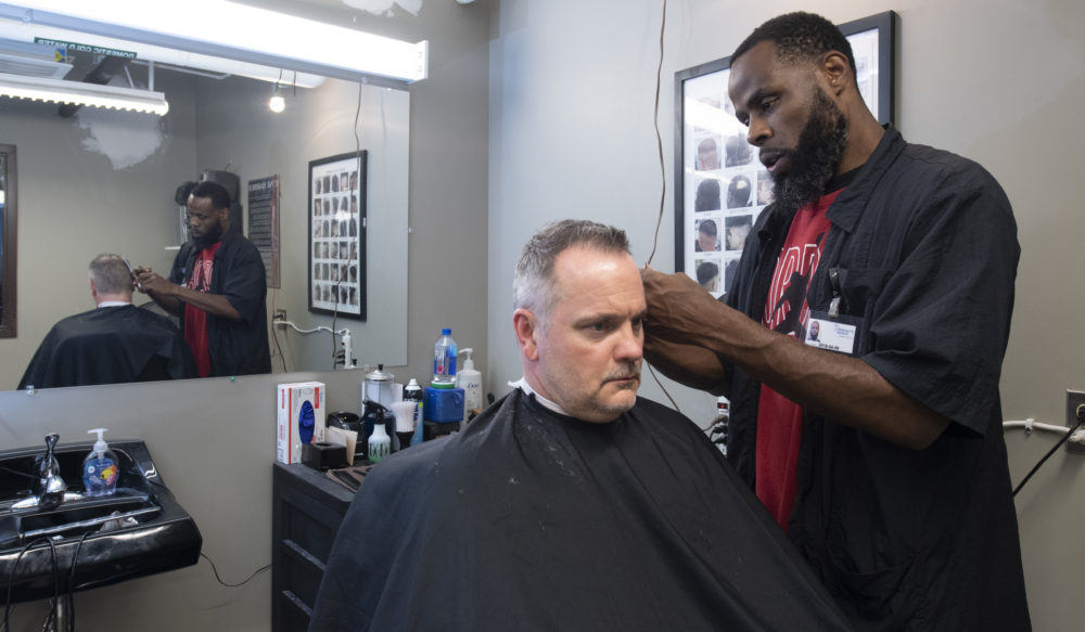 a man getting a haircut