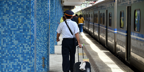 train conductor on platform