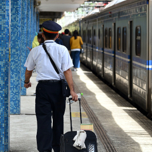 train conductor on platform