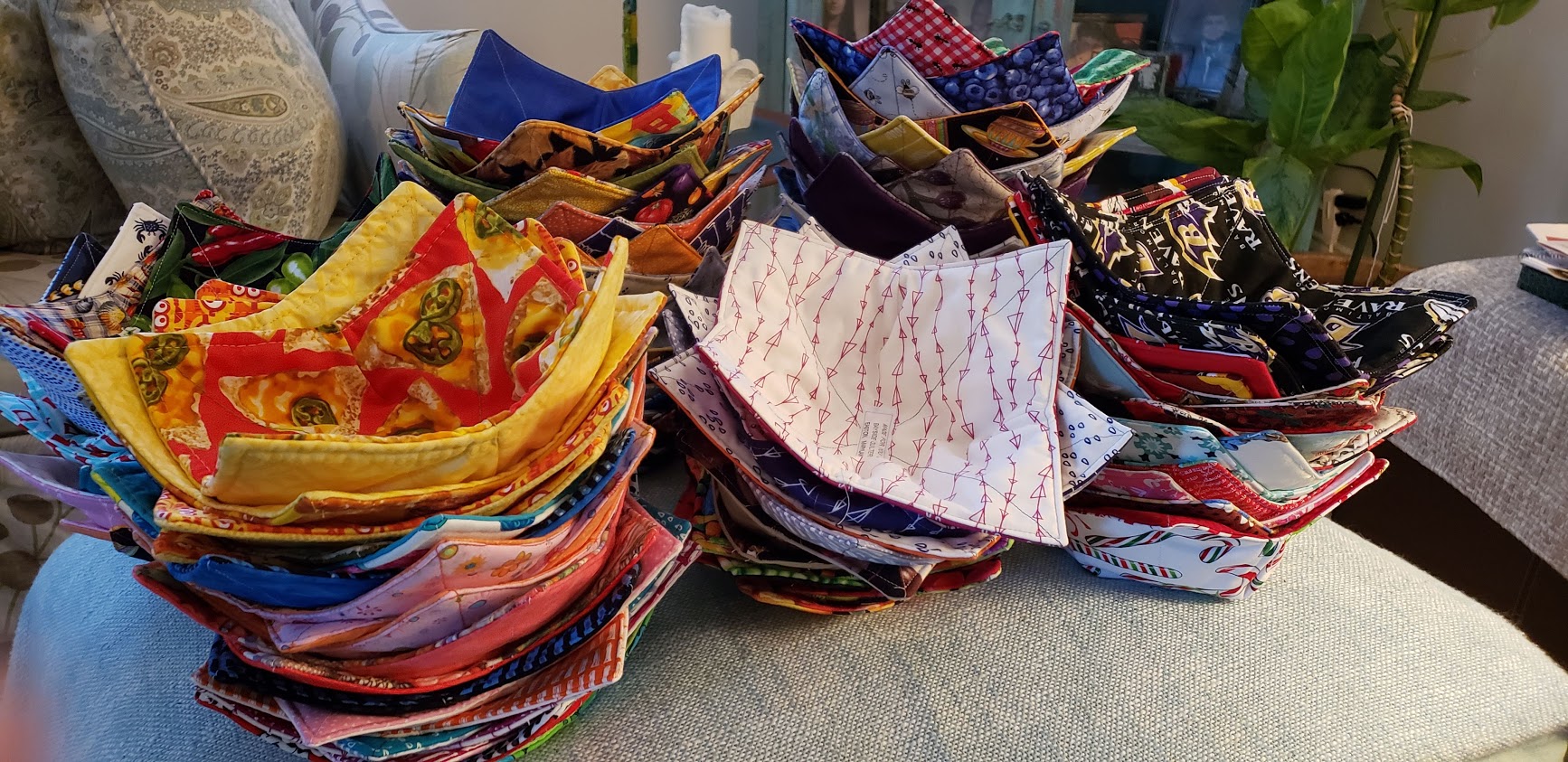 Soup bowl cozies stacked on a table