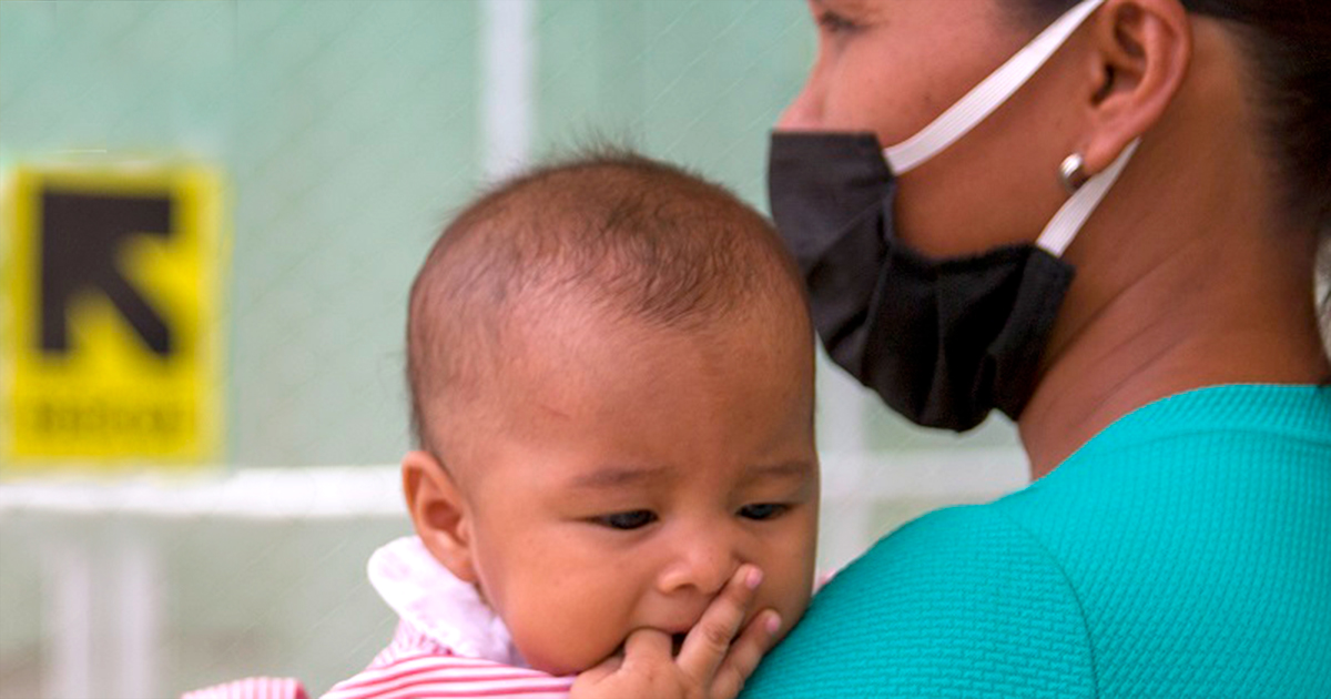 Mother holding child