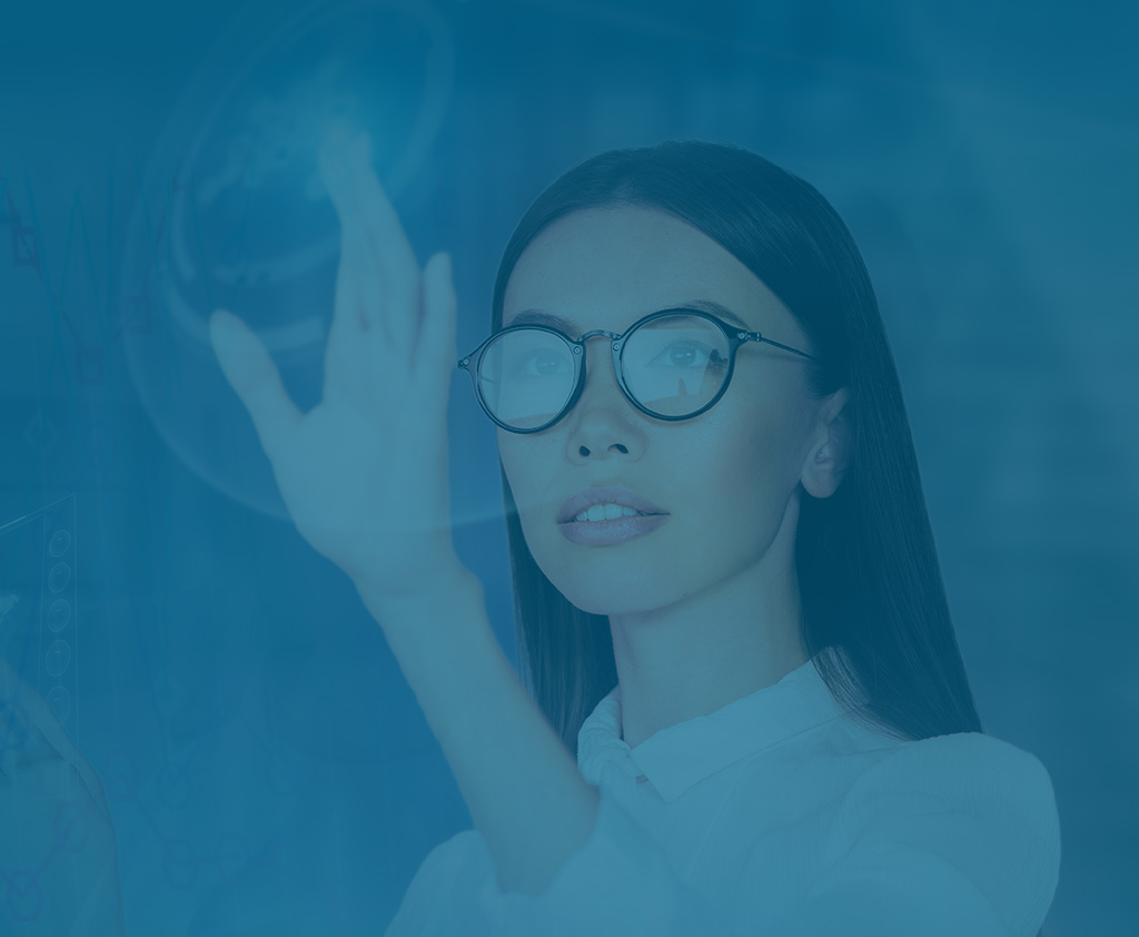Woman with glasses reaching up to touch visual data and Qlarant viewfinder