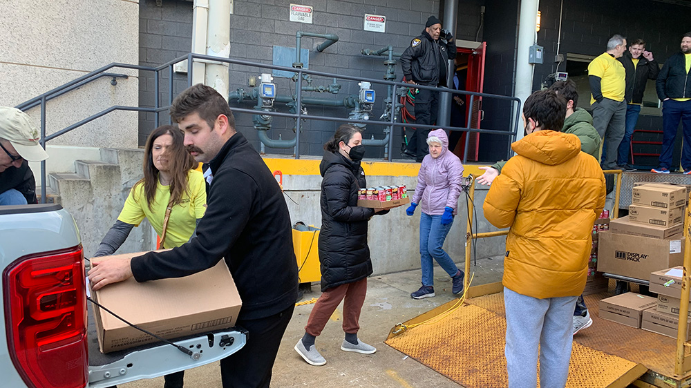 Volunteers at a loading dock