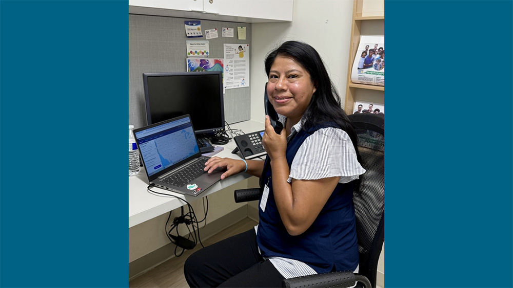 BREM Worker at desk