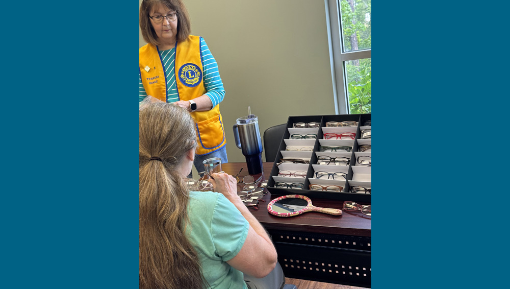 client selecting glasses